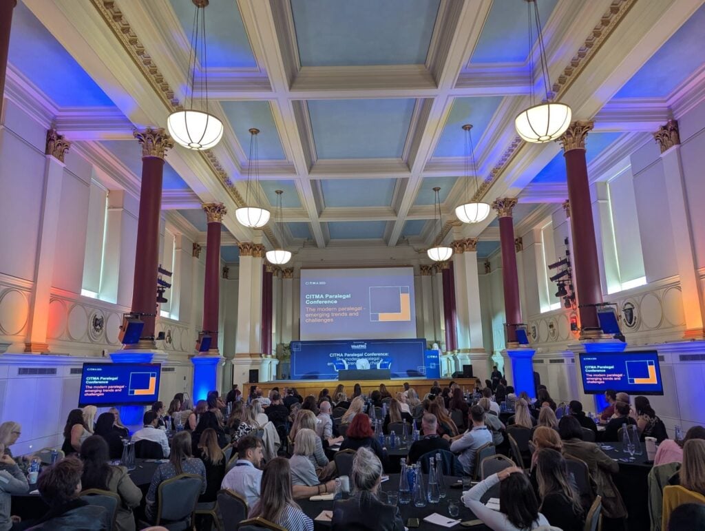 A packed audience for a speaker presentation at the CITMA Paralegal Conference