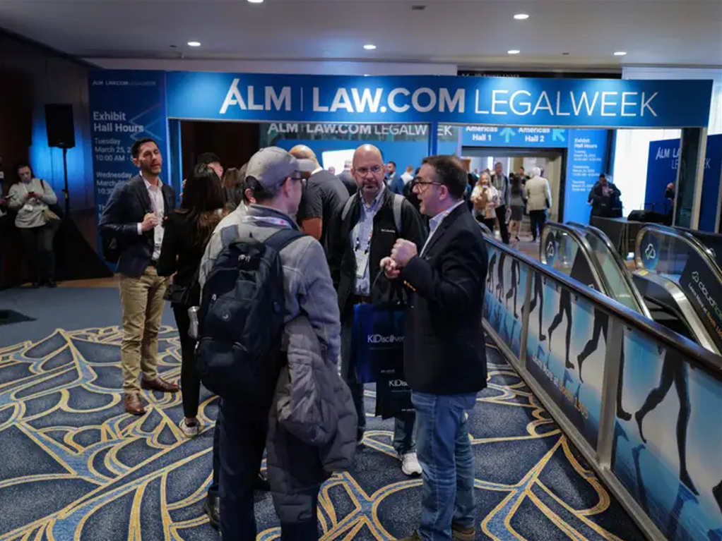 Legal professionals in the lobby during Legalweek.